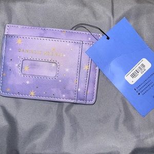 Disney Tangled cardholder , brand new never used it’s a beautiful purple color .